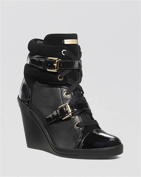 michael kors black hi tops|Michael Kors wedge sneakers.